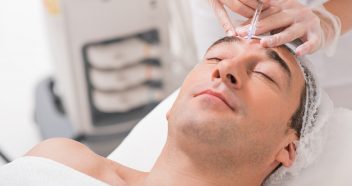 man undergoing facial rejuvenation procedure