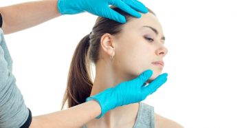 woman's nose being examined